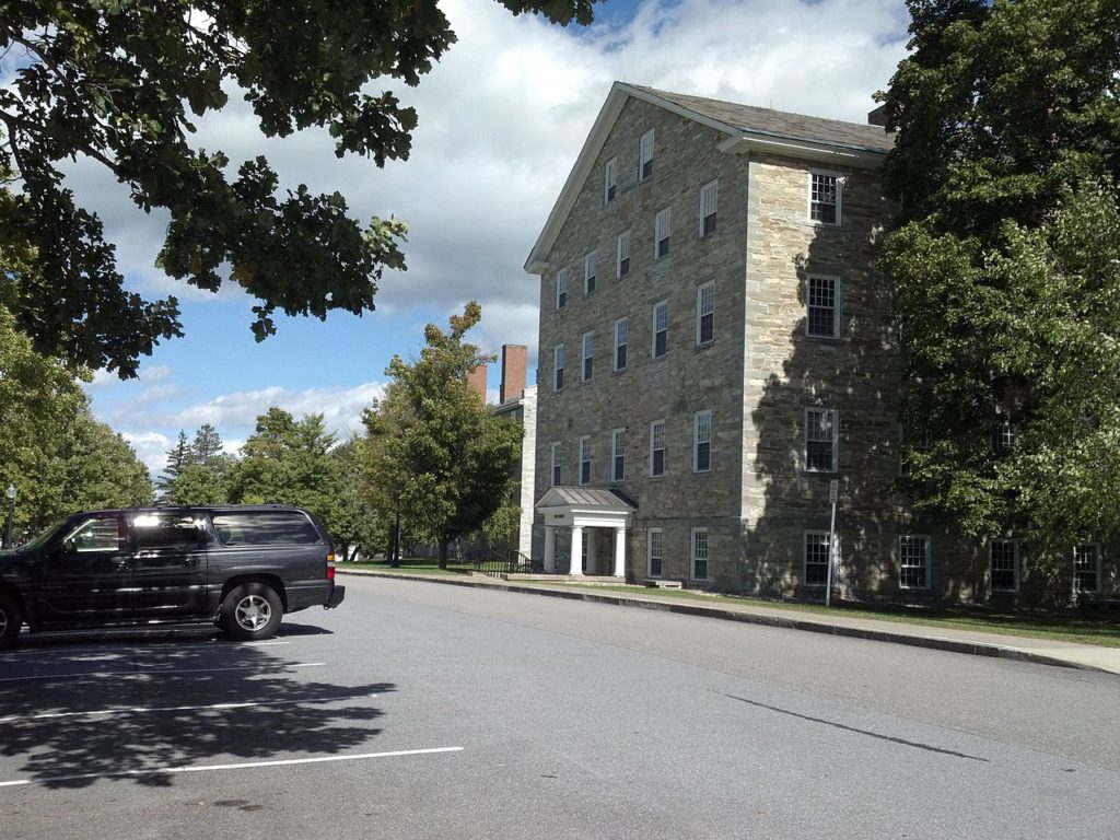 How to get into Middlebury; collegeadvisor.com image: a photo of stone row on middlebury campus